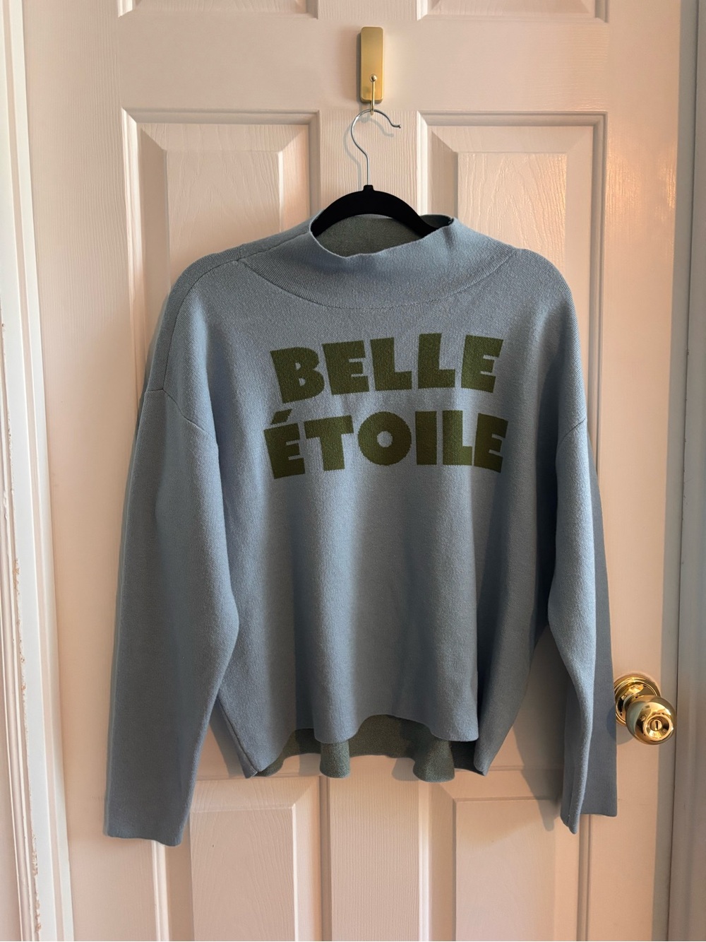Maeve Light Blue Sweater with Olive Green 'BELLE ÉTOILE' Logo